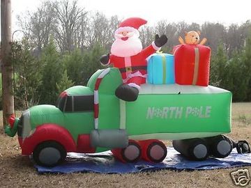 O Natal inflável gigante dos produtos da propaganda Ornaments Papai Noel com carro
