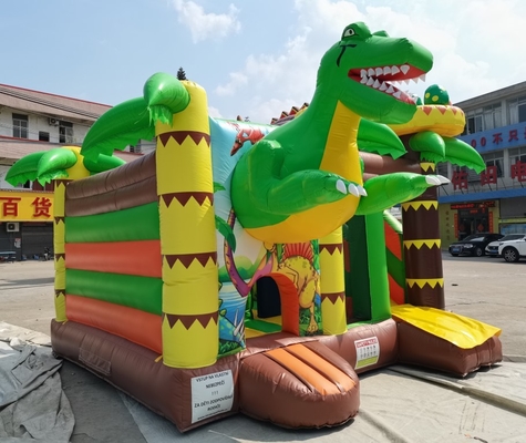Castelo Bouncy inflável feito sob encomenda com a casa do salto do tema dos dinossauros da corrediça para crianças