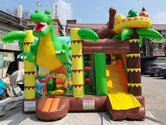 Castelo Bouncy inflável feito sob encomenda com a casa do salto do tema dos dinossauros da corrediça para crianças