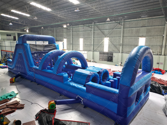 Castelo insuflável comercial azul moderno com escorrega e curso de obstáculos para adultos e crianças