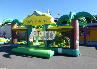 O equipamento material interno exterior do PVC de n brinca o campo de jogos inflável da criança grande do tema da selva
